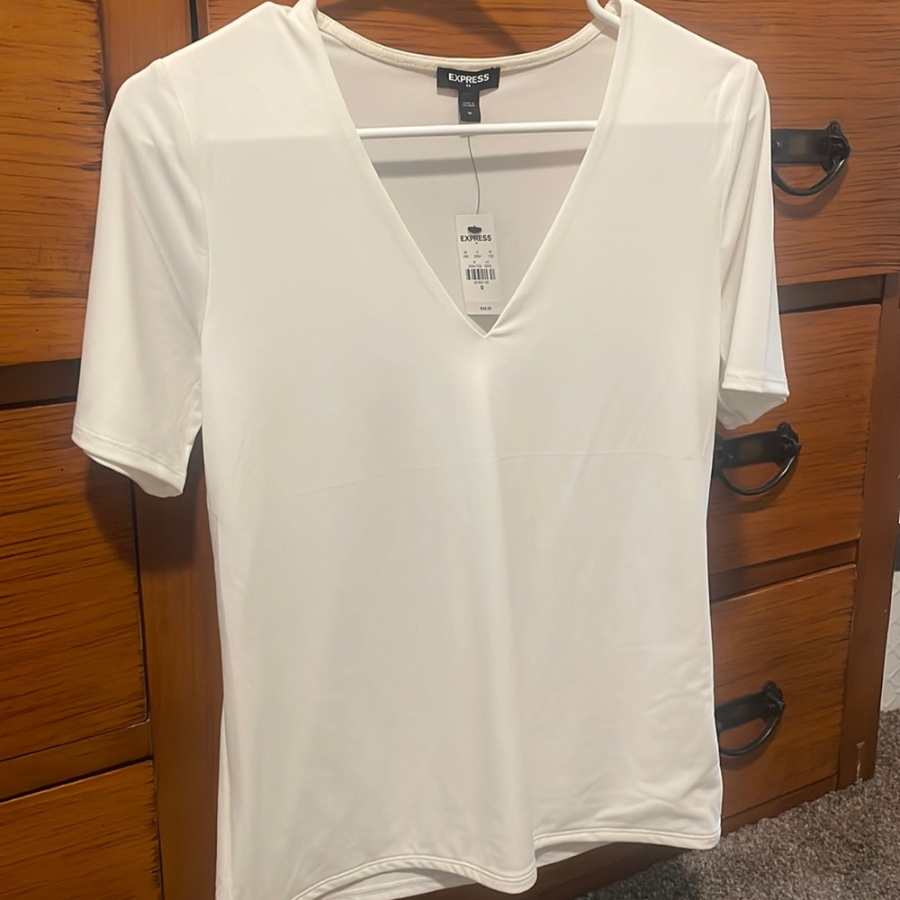 Express Womens Top. Size Medium. NEW WITH TAG.